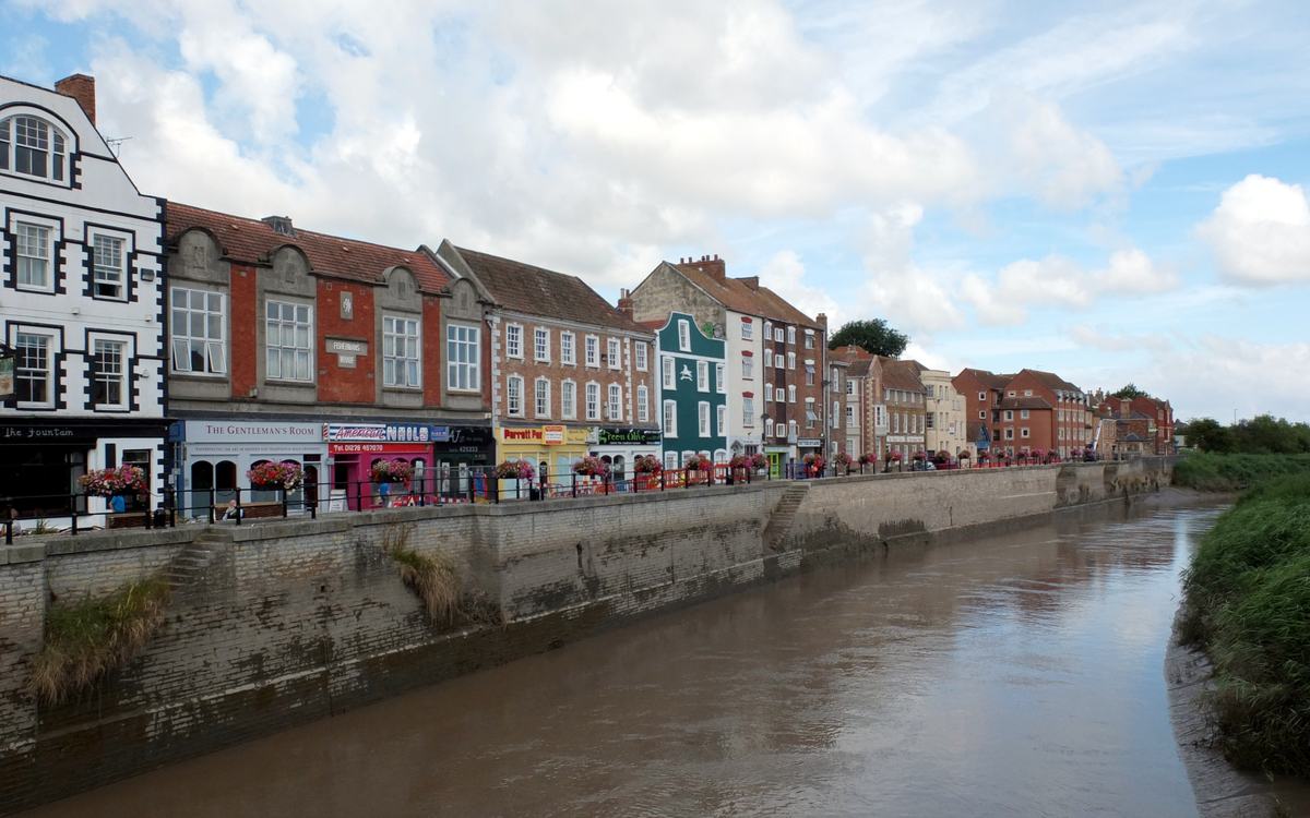 Colourful historic buildings along West Quay beside the River Parrett in Bridgwater, Somerset